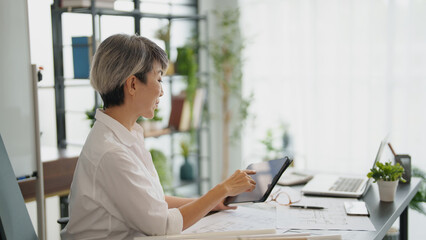 Senior business asian woman architect engineer