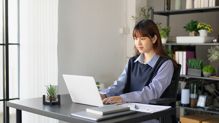 Asian woman working at home. Work from home concept