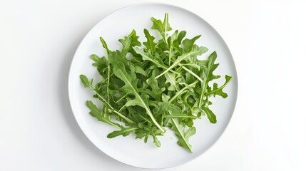 arugula leaves on a white plate