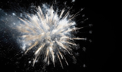 At night, brilliant fireworks bloom in the sky