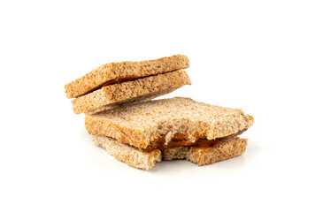 Bitten dried pate sandwich isolated, low-quality food leftovers, bad quality toast bread lunch