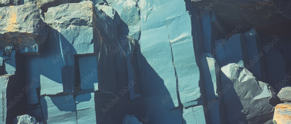 Poster Exploring dramatic cliffs with vertical faces and striking layered rock textures