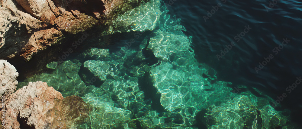 Poster lush hidden grotto with cool water inviting exploration in serene environment
