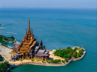 Sanctuary of Truth wooden temple on beach of Chonburi, Pattaya Thailand, aerial top view