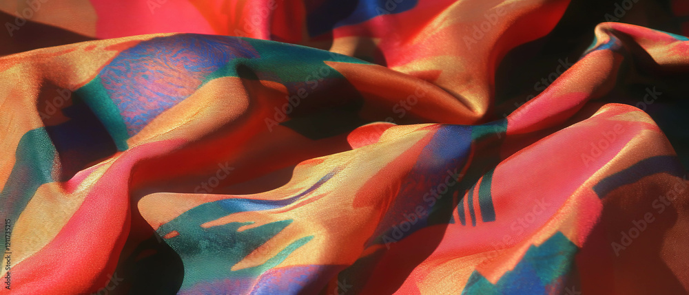 Poster vibrant printed silk with intricate patterns and bold colors showcasing rich texture
