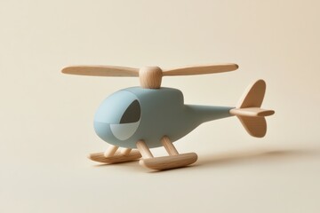 Light blue wooden toy helicopter on beige background.