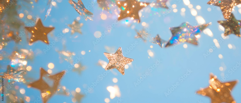 Poster Sparkling stars and varied shapes create a mesmerizing celestial texture against a blue backdrop