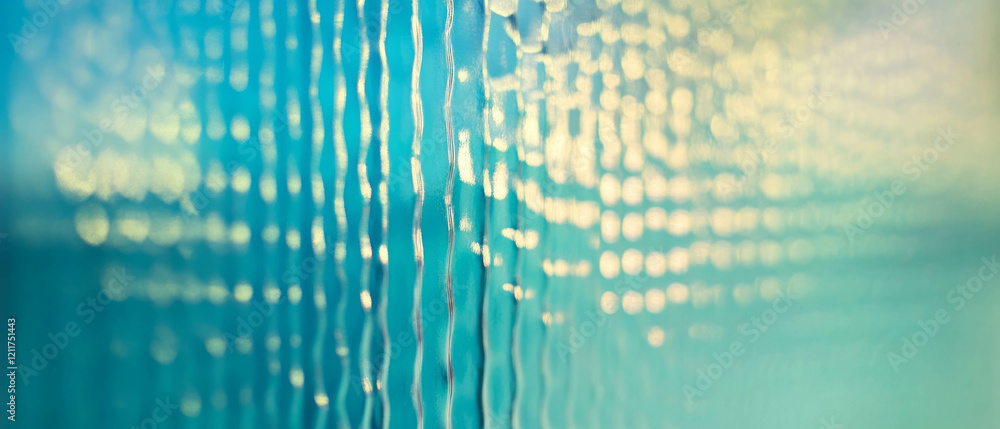 Aufkleber unique tactile surface with raised patterns on textured matte glass in soft light