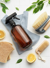 Eco friendly cleaning products promoting sustainable lifestyle with lemons and brushes