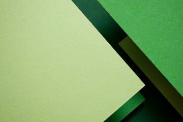 Two tone geometric green 3d background, copy space