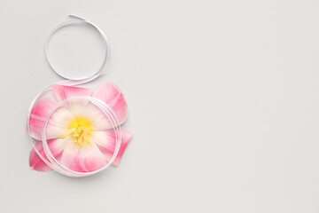 Figure 8 made of ribbon and flower for Women's Day celebration on white background