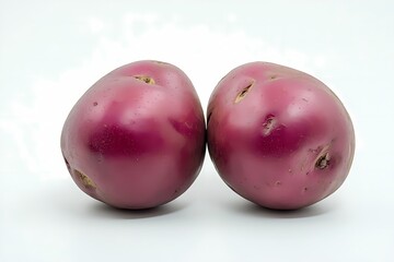 Two Red Potatoes Resting Side By Side