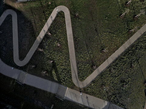 long staircase is an obstacle for wheelchair users and mothers with prams. scooters and bicycles will also prefer winding parallel path that is longer than direct shortcut with stairs. rights disabled