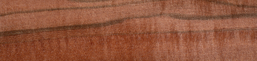 Tineo veneer with distinctive wave-like patterns and a warm blush hue