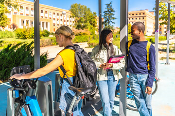 Student choosing bike in a public bicycle service area