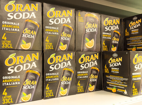 Oran soda display in store, original italian aranciata, 33cl cans