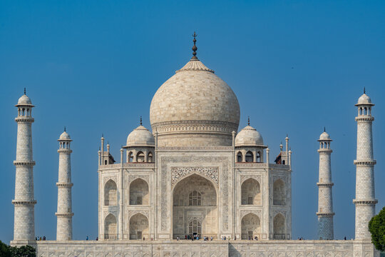 India. Uttar Pradesh state. Agra. Taj Mahal. White marble mausoleum built by the Muslim Mughal emperor Shah Jahan in memory of his wife Mumtaz Mahal. The Taj Mahal under a blue sky