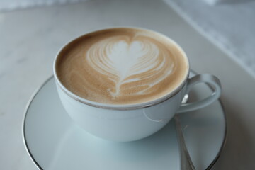 Hot latte at the cafe in the morning