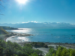 Breathtaking, expansive coastal vista unfolds in Kaikoura, Canterbury, New Zealand. Sparkling...