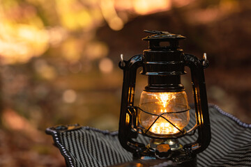 By the riverbank, lit lanterns, autumn camp