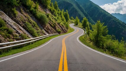 Fototapeta premium A beautiful curvy mountain greenery road 