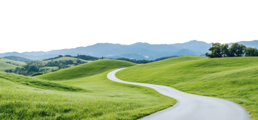 Winding road through idyllic green hills and mountains.