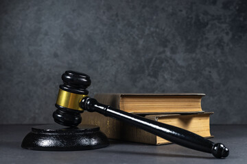 Law concept. Law book, Judge's gavel on dark background