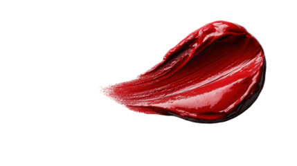 Vibrant red paint elegantly smeared across a white surface, showcasing an artistic expression