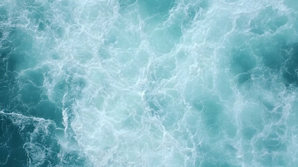 Fototapeta premium Ocean waves churning, top view, turquoise water, background texture for design