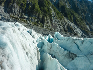 Deep crevasse cuts through ice of Franz Josef Glacier, Westland Tai Poutini National Park, South...