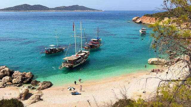 Soguk Su Koyu, Cold Water Bay, is a beach in Turkey located in the Fethiye district of Mugla Province. It is surrounded by mountains, vegetation, and has blue water. The beach is lined with yachts.4К