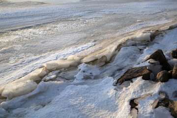 winter landscape, rocky sea shore with ice