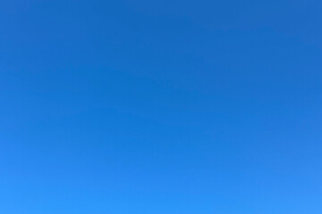 Bright blue summer cloudless sky on a sunny day, sky blue gradient, background, backdrop, desktop.