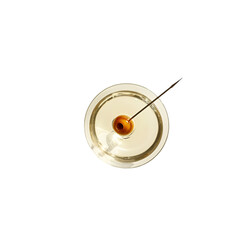 Overhead view of a cocktail glass with an olive on a cocktail stick.