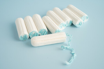 Menstruation cycle with sanitary cotton tampon for woman hygiene and protection.