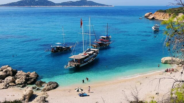 Soguk Su Koyu, Cold Water Bay, is a beach in Turkey located in the Fethiye district of Mugla Province. It is surrounded by mountains, vegetation, and has blue water. The beach is lined with yachts.4К