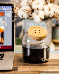 cup of coffee with teapot