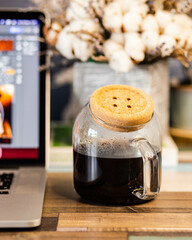 cup of coffee with teapot