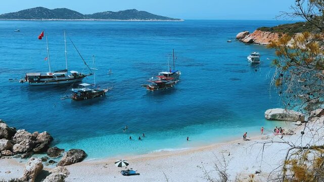 Soguk Su Koyu, Cold Water Bay, is a beach in Turkey located in the Fethiye district of Mugla Province. It is surrounded by mountains, vegetation, and has blue water. The beach is lined with yachts.4К