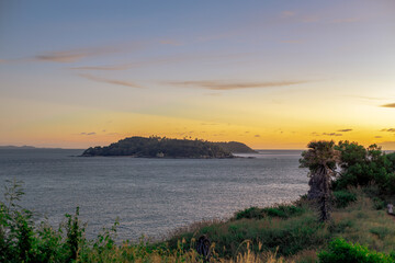 Background of young couples or solo travelers watching the natural light of the sunset at the...