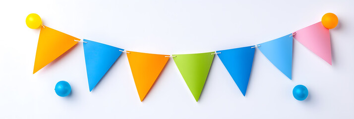 Colorful bunting party decoration with triangular flags in various hues, isolated on white background
