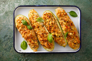 Baked zucchini with chicken and herbs