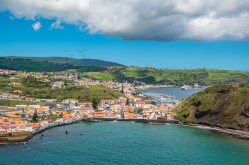 The City of Horta and Horta Bay Faial island of the Azores, Portugal. Aerial view of Portuguese town Horta on an the Atlantic ocean coast, on a sunny day, Faial island. © Lizaveta