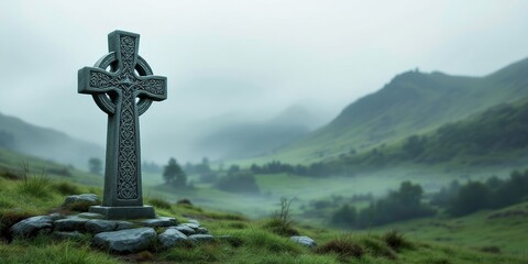 Celtic cross in misty green hills landscape with ancient stone and lush foggy surroundings