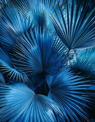 Obraz premium Blue palm leaves background. Blue monday concept. Generated image