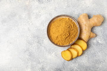 Fresh ginger on wooden background. Dry ginger. Sliced ​​ginger with honey and lemon. Ginger...