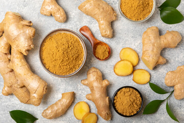 Fresh ginger on wooden background. Dry ginger. Sliced ​​ginger with honey and lemon. Ginger...