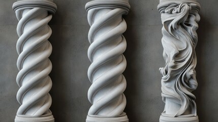 Three ornate columns with different designs spiral, twisted, and sculpted.