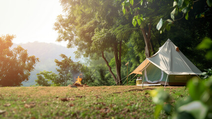 serene camping scene featuring tent, campfire, and lush greenery