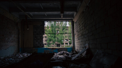 destroyed and burned houses in the city in Ukraine